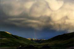 Matthieu Ricard: Stormy sky and rainbow, Tibet, 2005